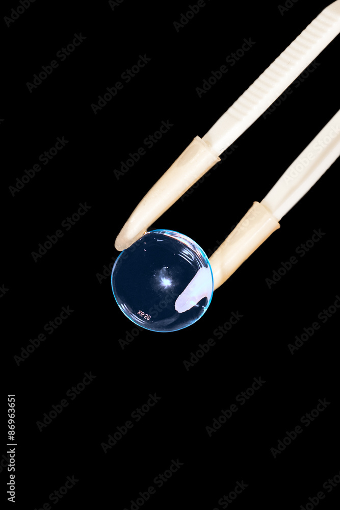 Contact lens on an black background Contact lens on an black background