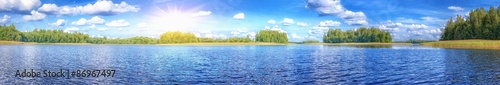 Landscape of beautiful lake at summer sunny day panoramic