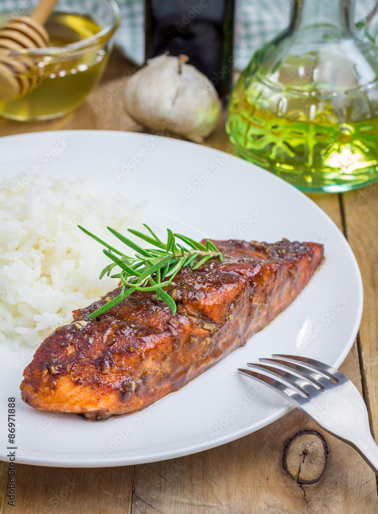 Baked salmon fillet in balsamic-honey sauce with rice Baked salmon fillet in balsamic-honey sauce with rice