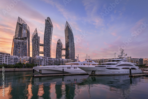 Modern architecture and large yachts in Singapore. photo