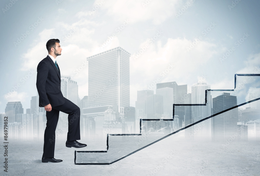 Business person in front of a staircase Business person in front of a staircase