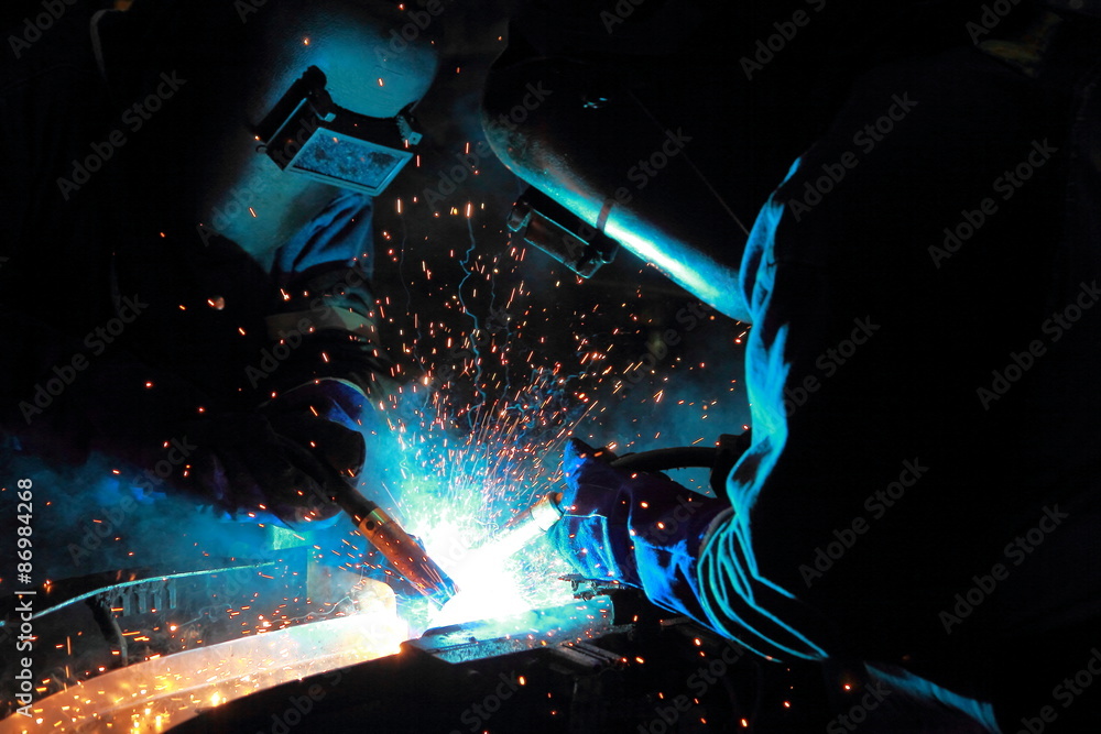 The working in Welding skill up use in product part automotiv The working in Welding skill up use in product part automotiv