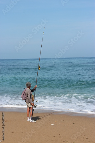 Pêcheur sur la plage