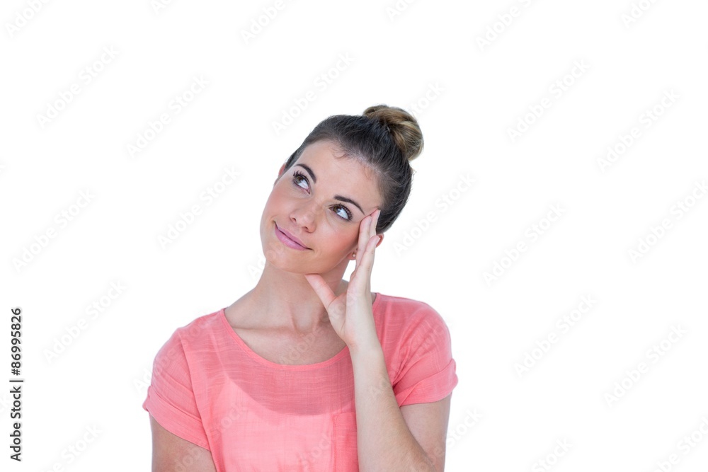 Thoughtful pretty casual brunette standing with hand on head Thoughtful pretty casual brunette standing with hand on head