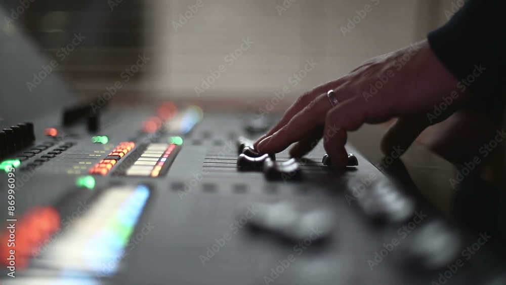 Man mixing sound at professional sound mixer. Man mixing sound at professional sound mixer.