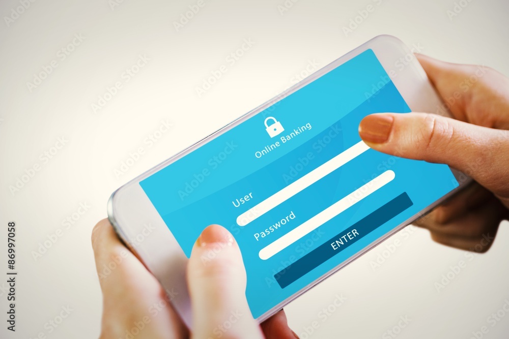 Composite image of hand holding smartphone Composite image of hand holding smartphone