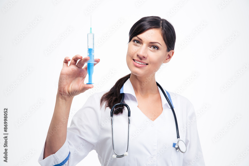 Smiling female doctor holding syringe Smiling female doctor holding syringe