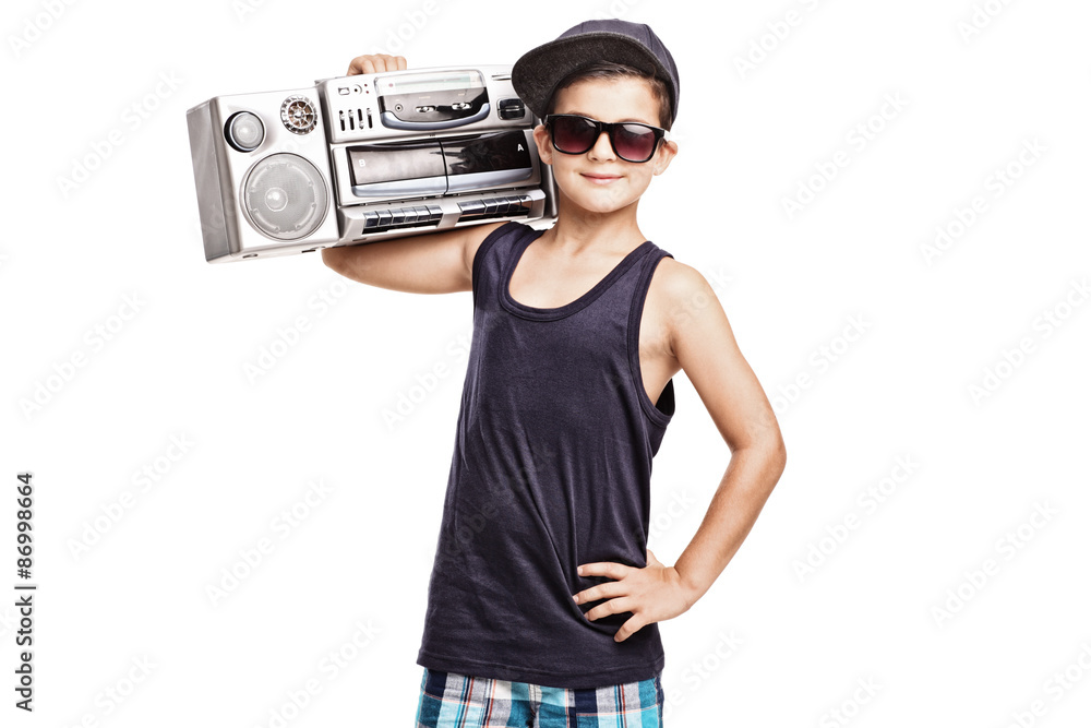 Cool boy in hip hop outfit holding a ghetto blaster Cool boy in hip hop outfit holding a ghetto blaster