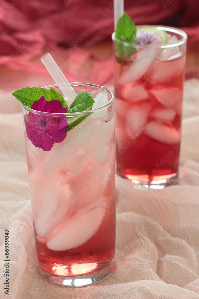 Glass of freshly prepared, cold and refreshing pomegranate drink. Glass of freshly prepared, cold and refreshing pomegranate drink.