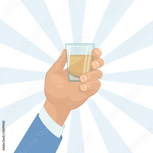 Hand holding a shot of drink