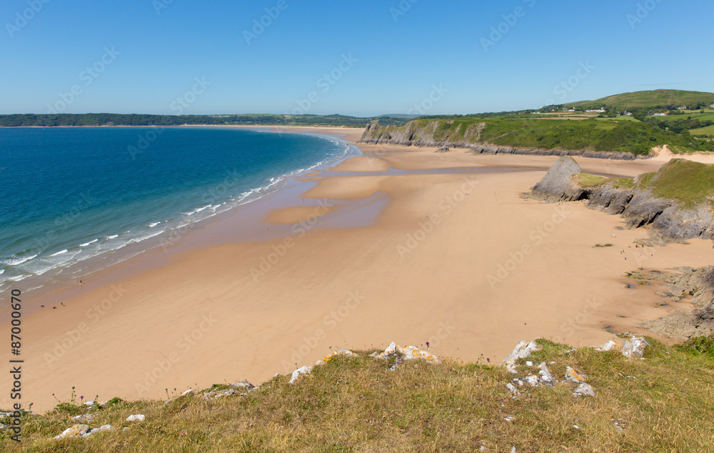 Sandy Pobbles beach The Gower Peninsula Wales uk by 3 Cliffs