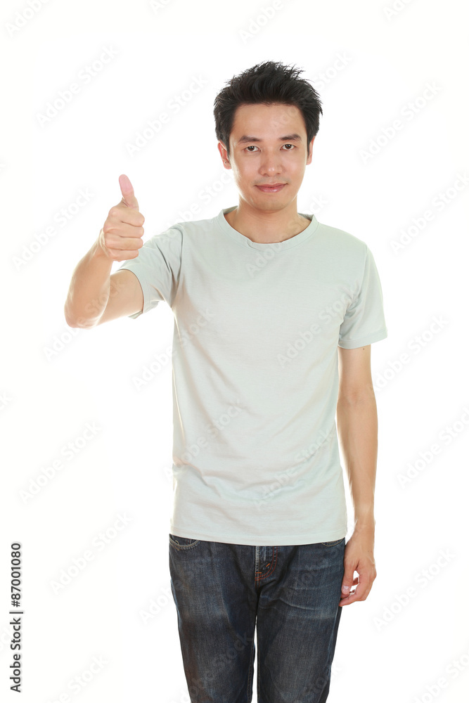 man in blank t-shirt with thumbs up man in blank t-shirt with thumbs up