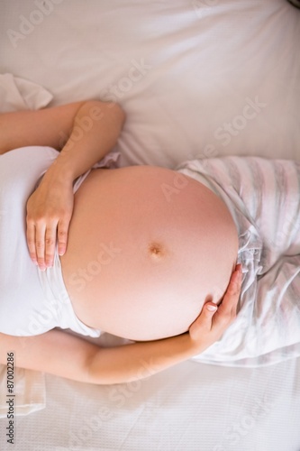 Close up view of pregnant woman belly 