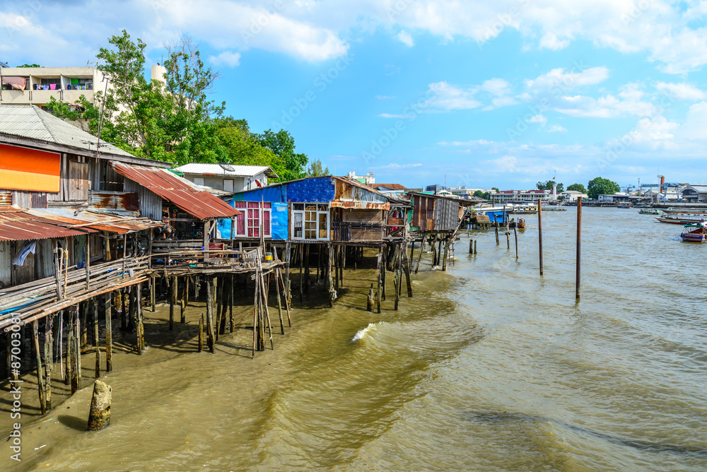 Thai traditional house, vilage riverfront in Bangkok thailand.