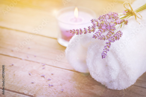 Spa still life with lavender, towel and candle on wood