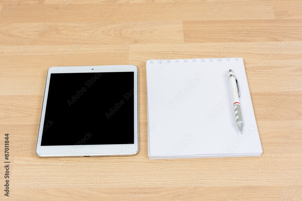 White digital Tablet on wooden White digital Tablet on wooden