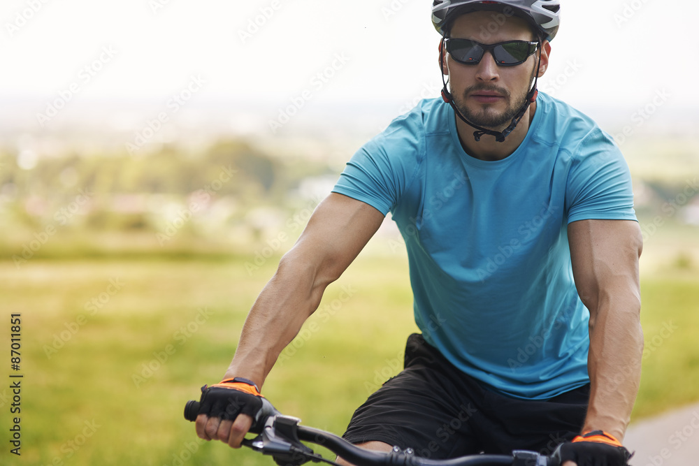 Well built man riding a bike Well built man riding a bike