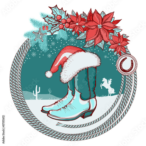 American cowboy boots and Santa red hat on Christmas background