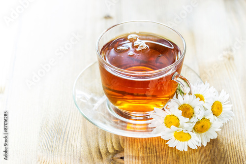 Cup of tea with chamomile