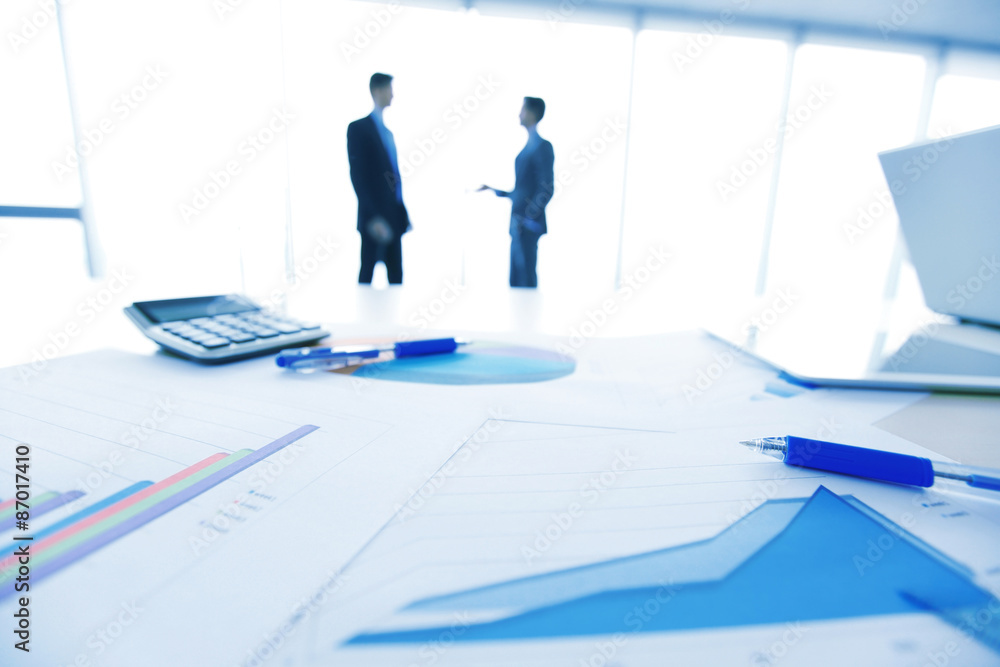 Businessmen and documents