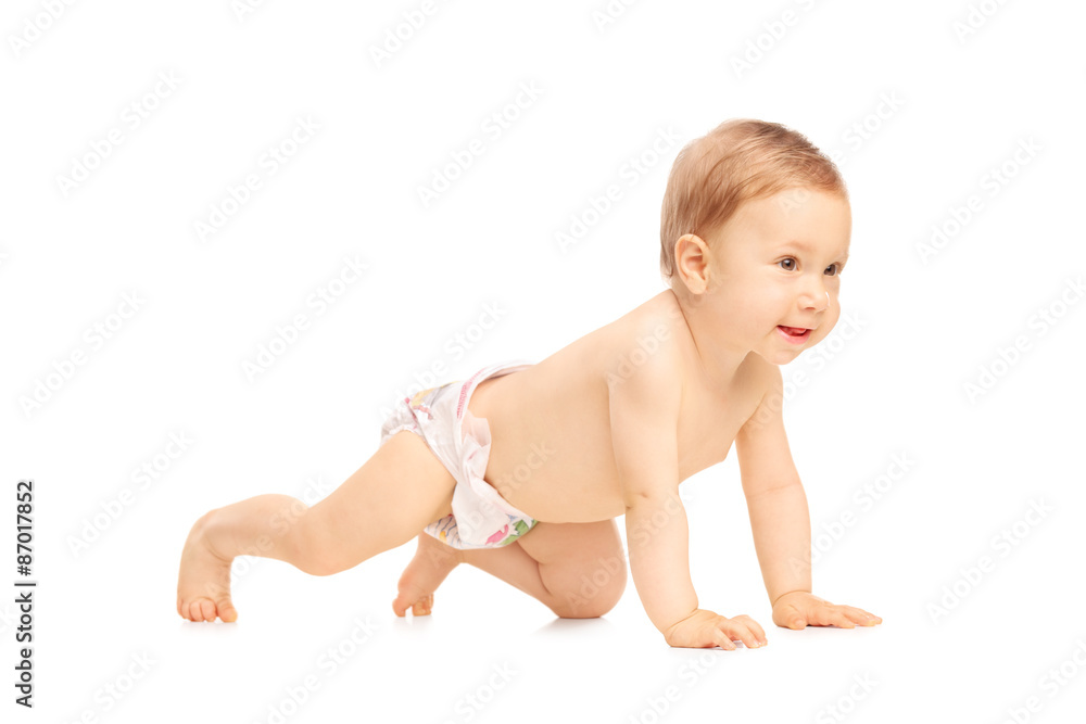 Adorable little baby girl crawling on the floor Adorable little baby girl crawling on the floor
