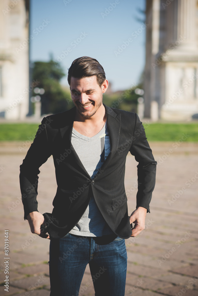 Young handsome italian boy walking in the city Young handsome italian boy walking in the city