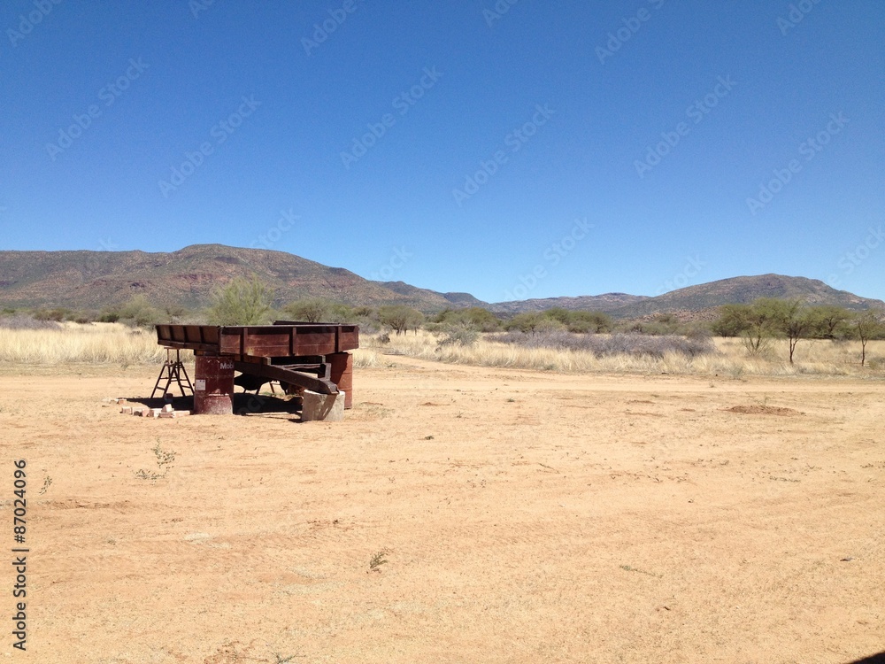 Obraz premium Wüste mit altem Karren