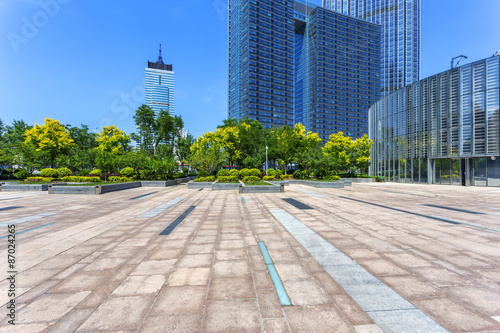 Modern skyline and empty road floor © zhu difeng