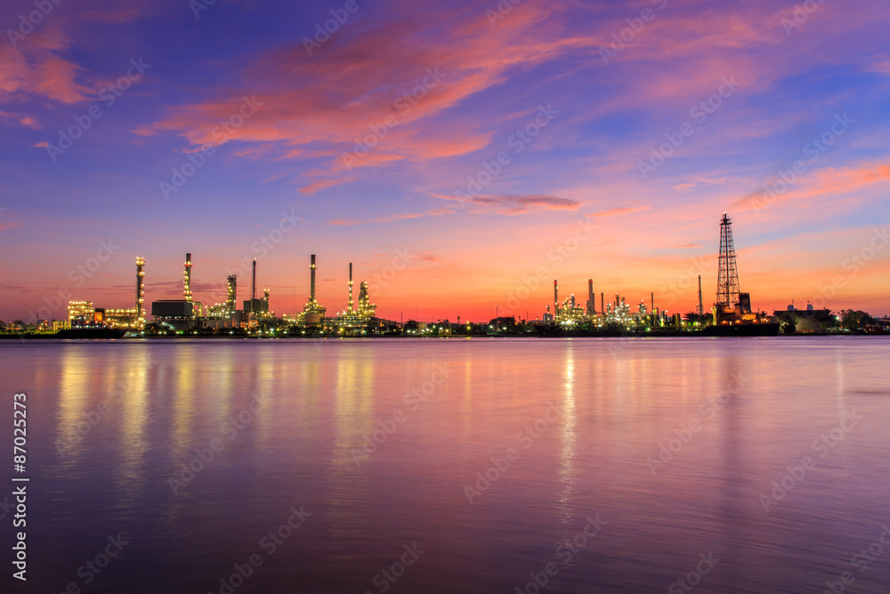 Oil refinery along the river at Dusk (Bangkok, Thailand)
