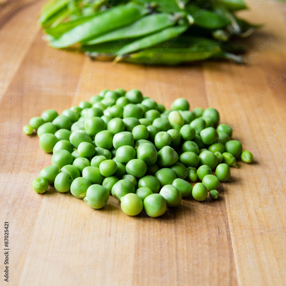 Pile of podded peas, soft focus Pile of podded peas, soft focus