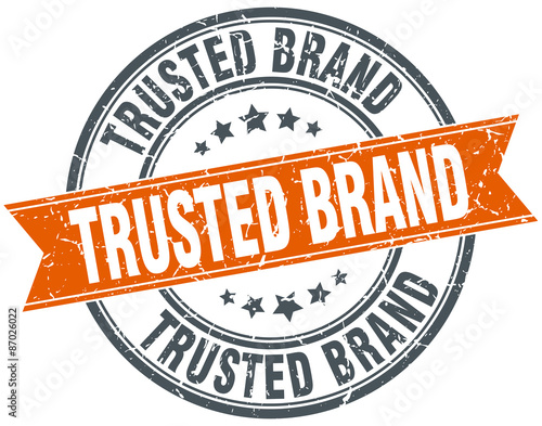 trusted brand round orange grungy vintage isolated stamp