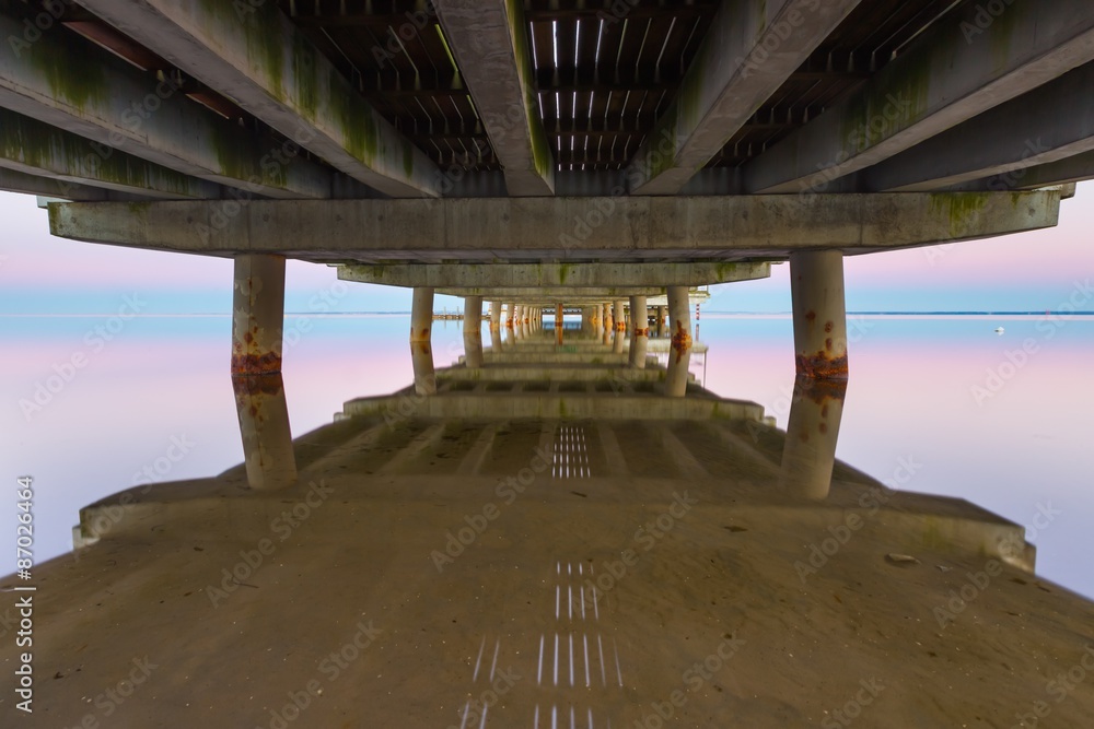 Beautiful wooden pier on Baltic sea shore