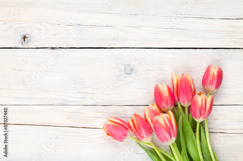Fototapeta Naklejka Na Ścianę i Meble -  Colorful tulips on wooden table