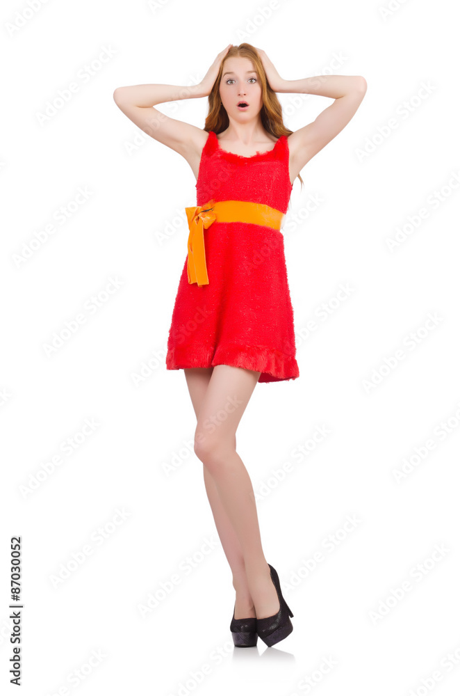 Shocked young girl in red dress isolated on white
