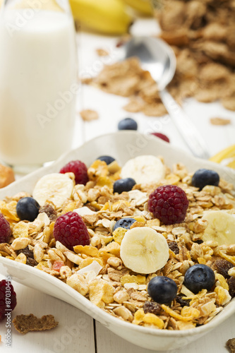 Light, delicious breakfast with cereal and fruit.