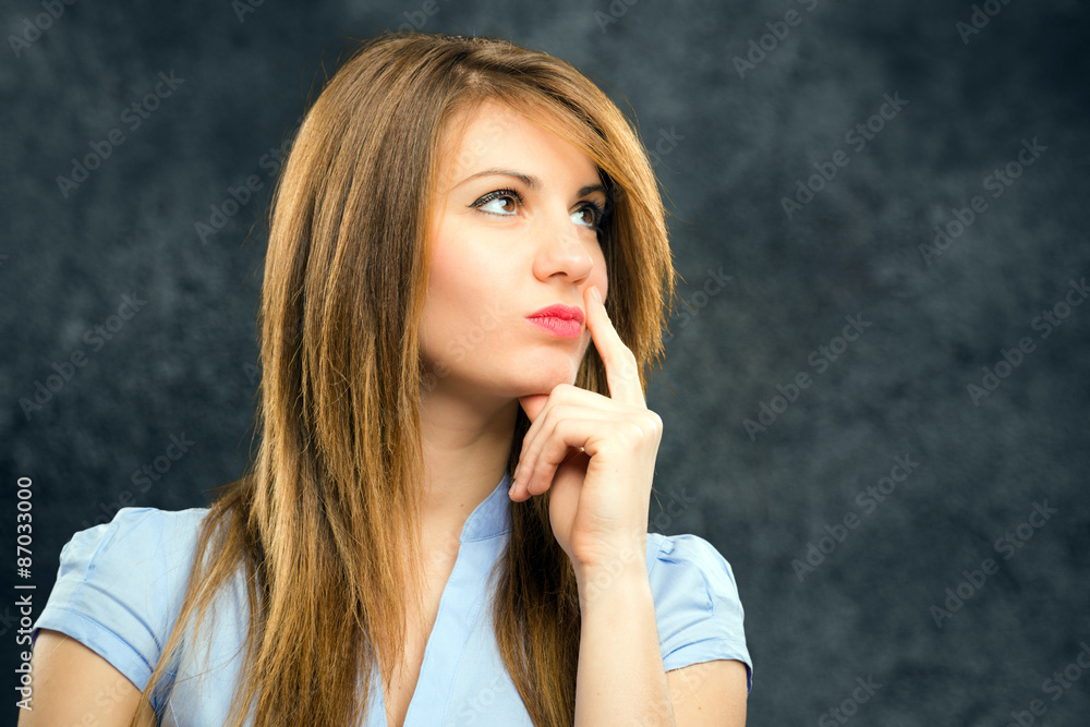 Fototapeta premium Thoughtful business woman