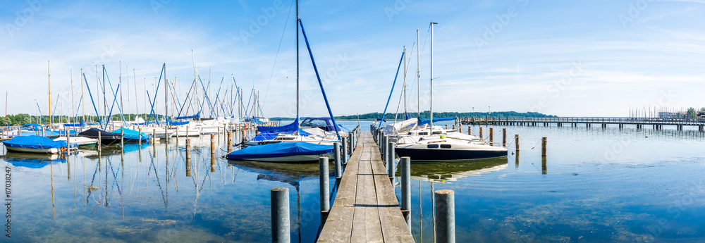 Fototapeta premium Bootssteg am Chiemsee - Panorama
