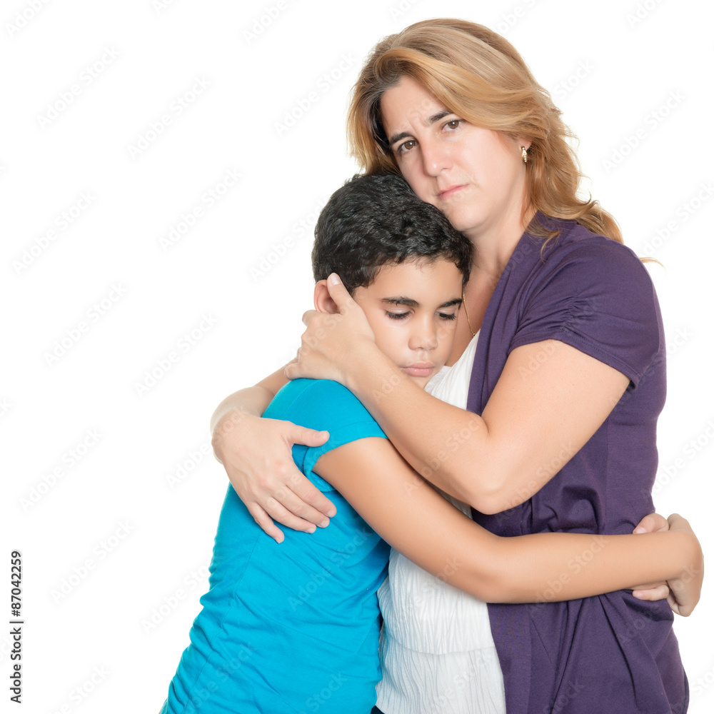 Sad mother hugging her son isolated on white Sad mother hugging her son isolated on white