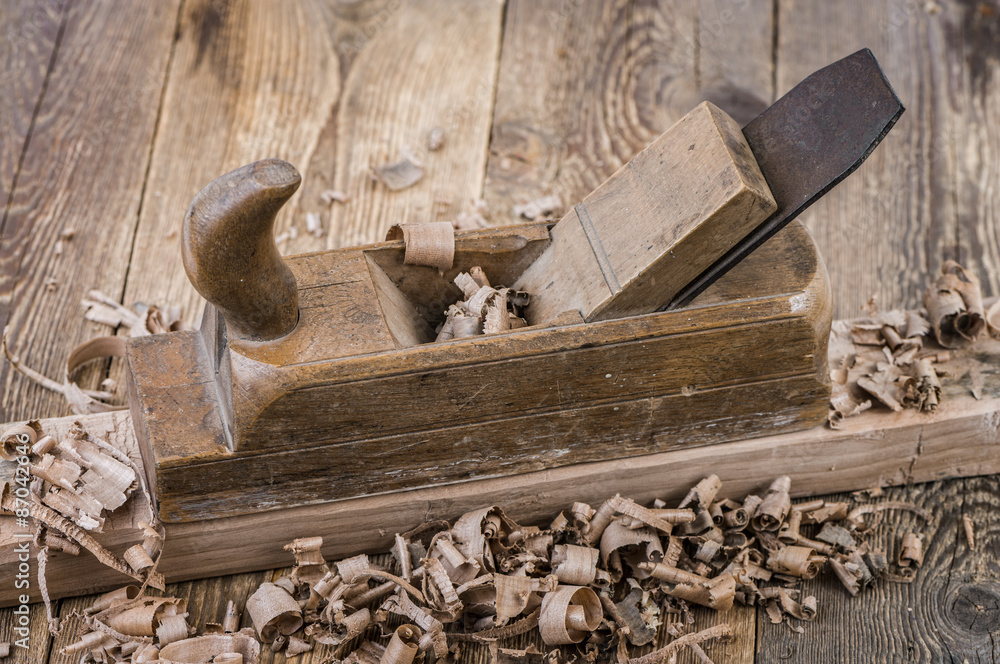 Old wooden plane in a workshop Old wooden plane in a workshop