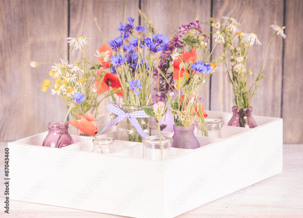 Wildflowers in bottles