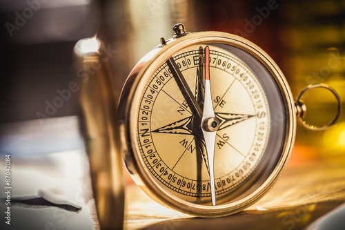 Compass, Gold, Discovery.