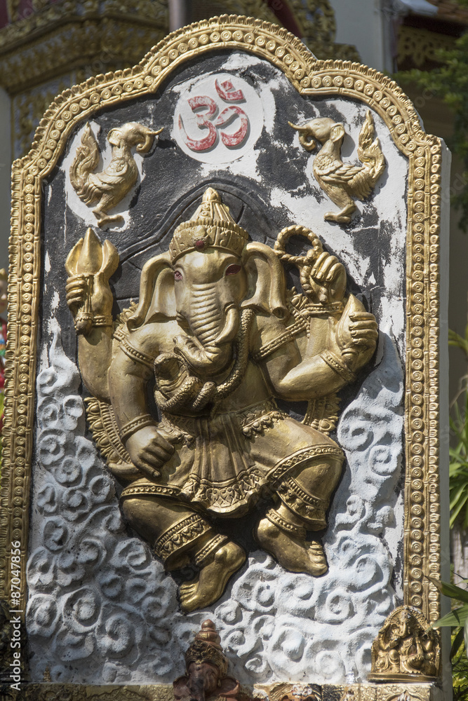 Although a Hindu god, a shrine to Ganesha, the elephant god, is located in the the Buddhist temple of Wat Phra That Doi Suthep.Chiang Mai, Thailand