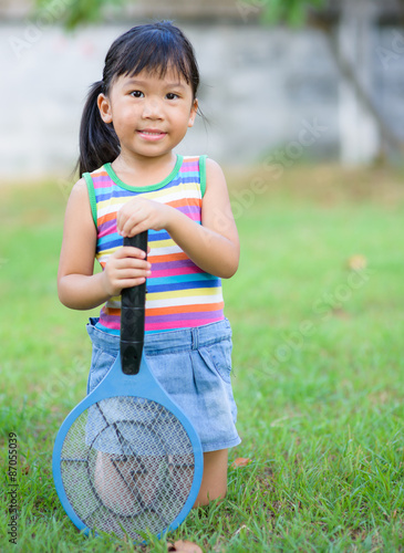 Cute asian holds electronic mosquito trap © kwanchaichaiudom