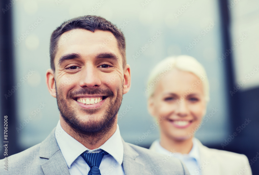 close up of smiling businessmen close up of smiling businessmen