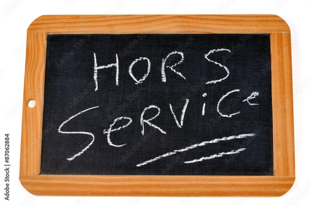 Hors service écrit sur une ardoise Hors service écrit sur une ardoise