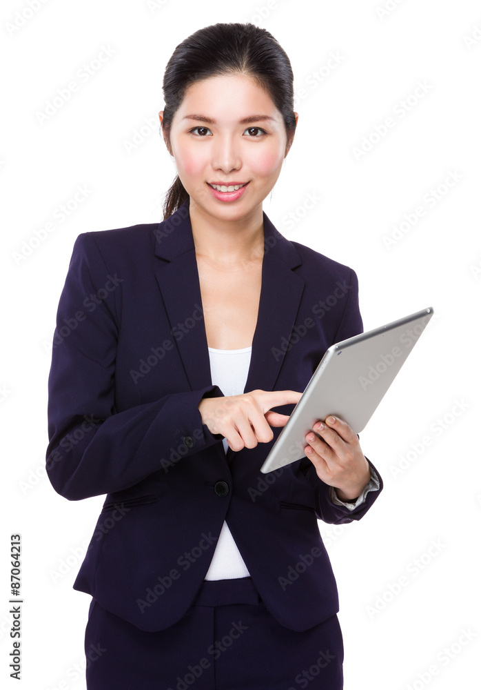 Young Businesswoman use of the tablet pc Young Businesswoman use of the tablet pc