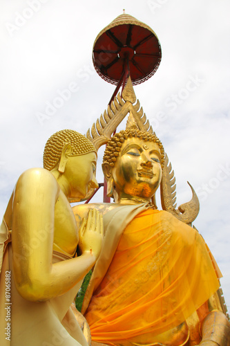 gold Buddha and gold attendant