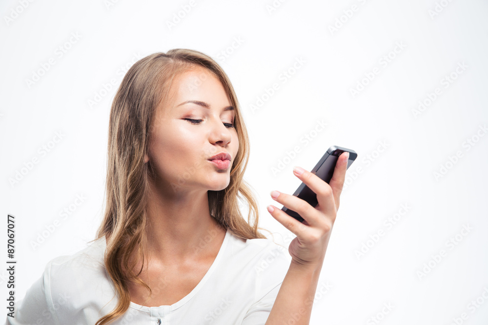 Girl doing video call with smartphone Girl doing video call with smartphone