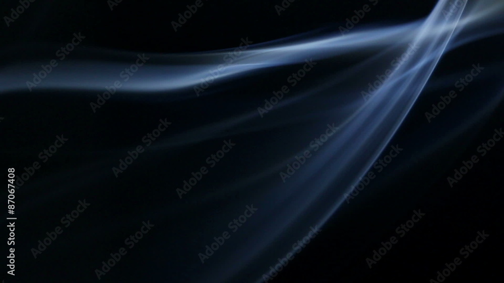 Blue smoke curves isolated on black background
