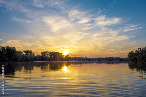 Sunrise / sunset at a lake